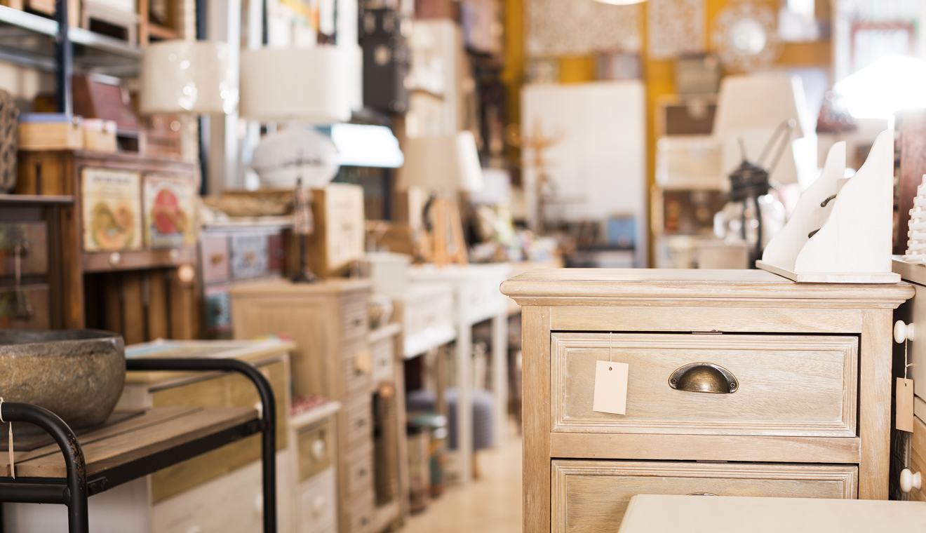 Furniture and home decor displayed inside a retail store.