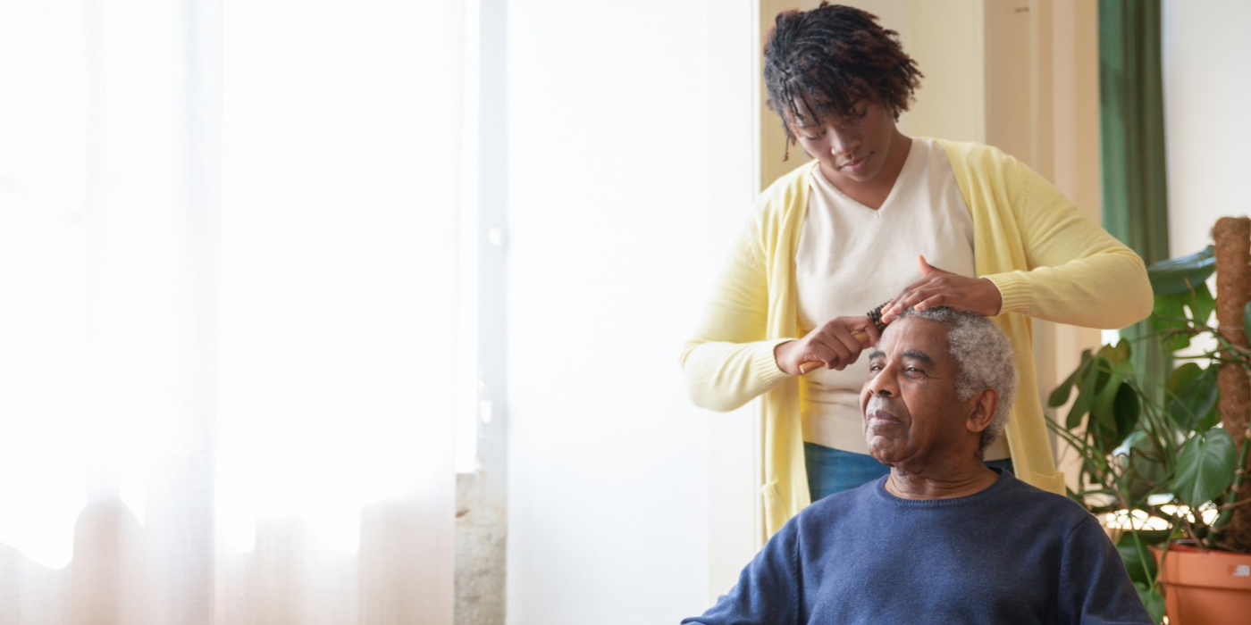 Women Brushing Father Hair 