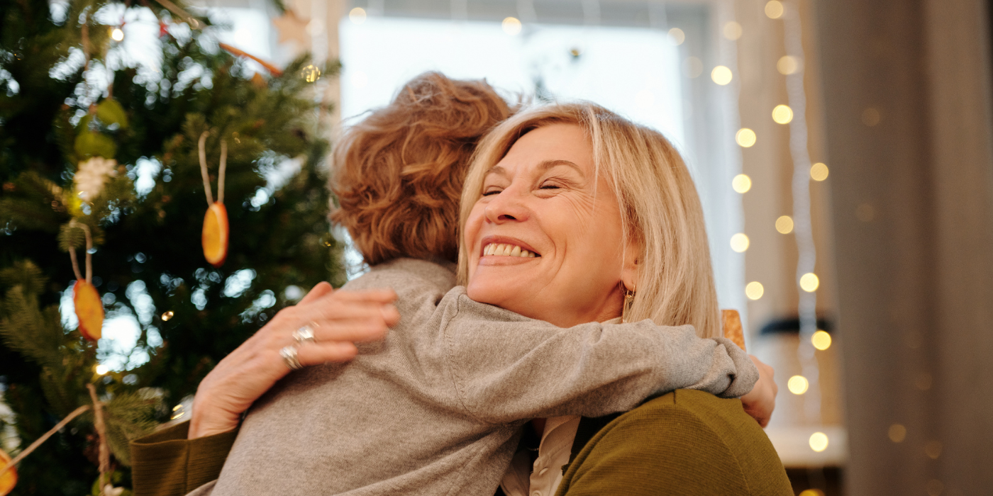 people hugging holiday